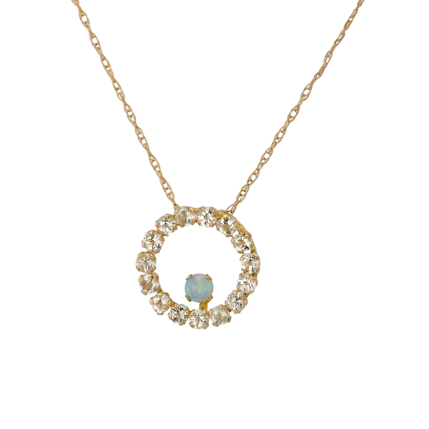 10kt yellow gold chain with white topaz and created opal circle pendant